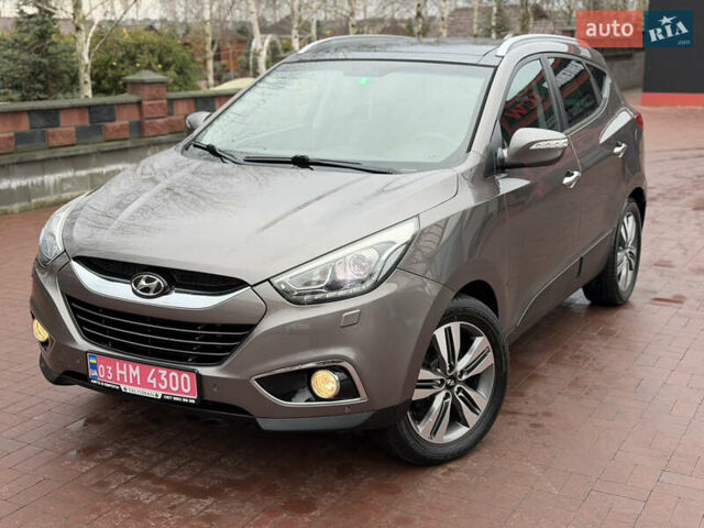 Коричневий Хендай іх35, об'ємом двигуна 2 л та пробігом 230 тис. км за 14300 $, фото 46 на Automoto.ua