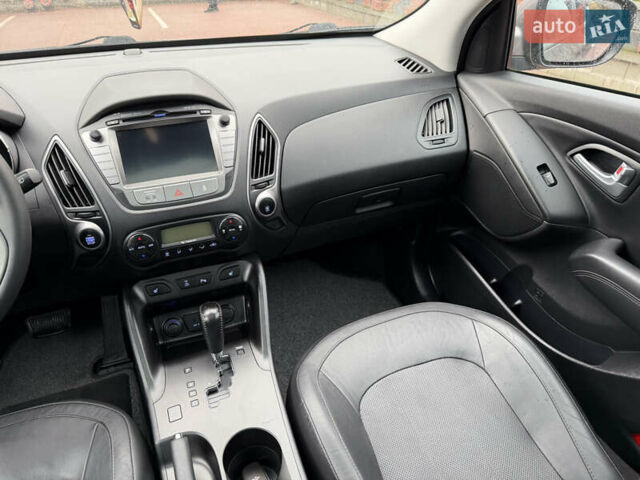 Коричневий Хендай іх35, об'ємом двигуна 2 л та пробігом 230 тис. км за 14300 $, фото 62 на Automoto.ua