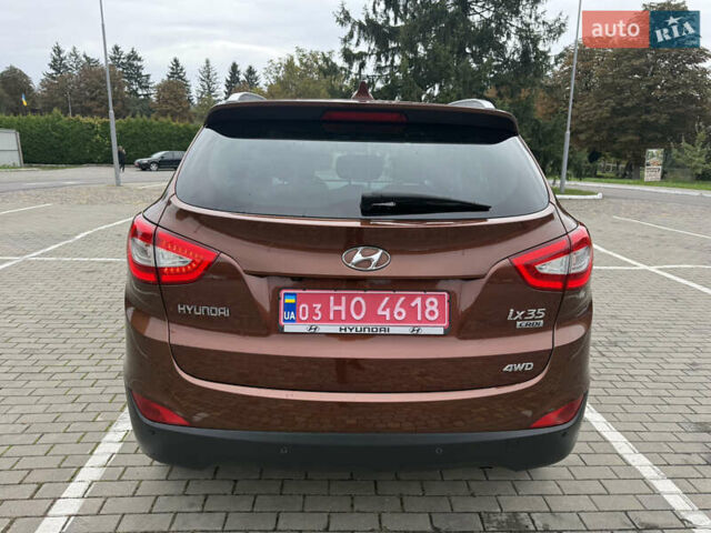 Коричневий Хендай іх35, об'ємом двигуна 2 л та пробігом 211 тис. км за 17400 $, фото 21 на Automoto.ua