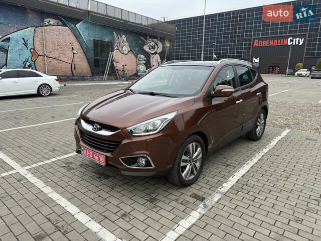 Коричневий Хендай іх35, об'ємом двигуна 2 л та пробігом 211 тис. км за 17400 $, фото 1 на Automoto.ua