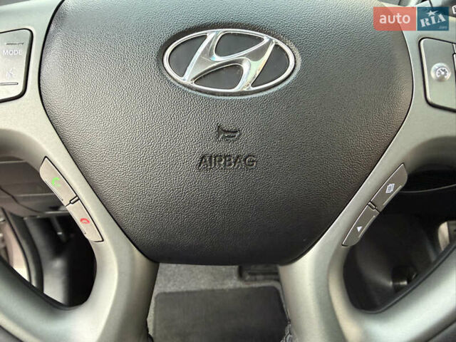 Коричневий Хендай іх35, об'ємом двигуна 2 л та пробігом 230 тис. км за 15300 $, фото 42 на Automoto.ua