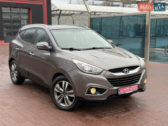 Коричневий Хендай іх35, об'ємом двигуна 2 л та пробігом 230 тис. км за 14300 $, фото 43 на Automoto.ua