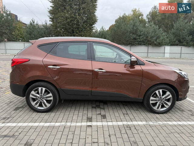 Коричневий Хендай іх35, об'ємом двигуна 2 л та пробігом 211 тис. км за 17400 $, фото 16 на Automoto.ua