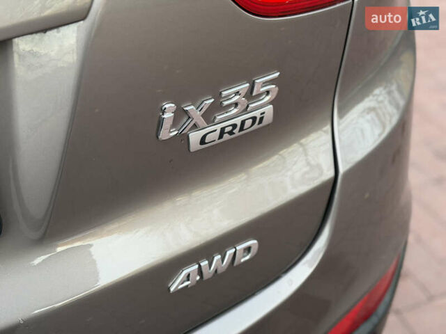 Коричневий Хендай іх35, об'ємом двигуна 2 л та пробігом 230 тис. км за 15300 $, фото 11 на Automoto.ua