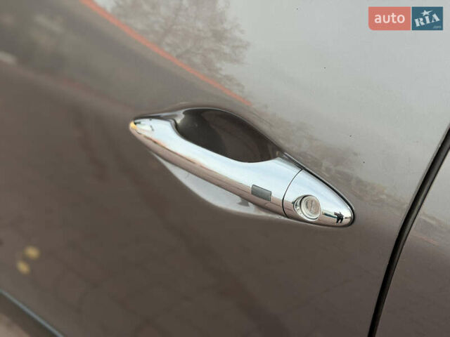 Коричневий Хендай іх35, об'ємом двигуна 2 л та пробігом 230 тис. км за 15300 $, фото 14 на Automoto.ua