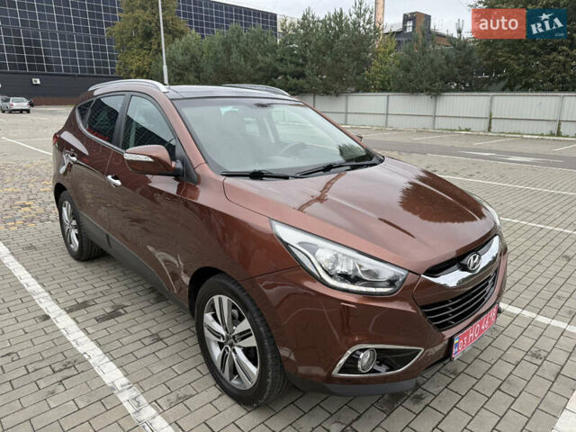Коричневий Хендай іх35, об'ємом двигуна 2 л та пробігом 211 тис. км за 17400 $, фото 11 на Automoto.ua