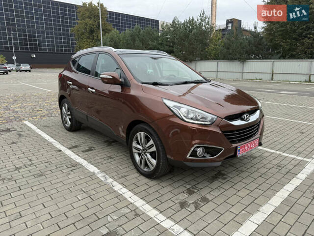 Коричневий Хендай іх35, об'ємом двигуна 2 л та пробігом 211 тис. км за 17400 $, фото 10 на Automoto.ua