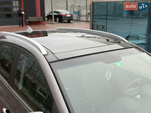 Коричневий Хендай іх35, об'ємом двигуна 2 л та пробігом 230 тис. км за 14300 $, фото 17 на Automoto.ua