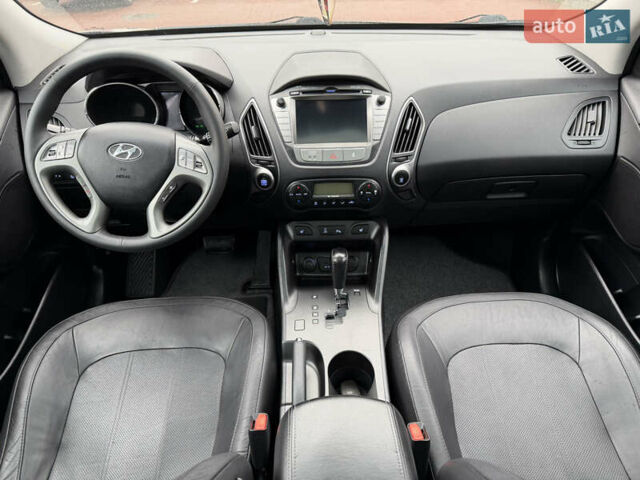 Коричневий Хендай іх35, об'ємом двигуна 2 л та пробігом 230 тис. км за 14300 $, фото 60 на Automoto.ua