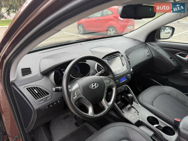 Коричневий Хендай іх35, об'ємом двигуна 2 л та пробігом 211 тис. км за 17400 $, фото 117 на Automoto.ua