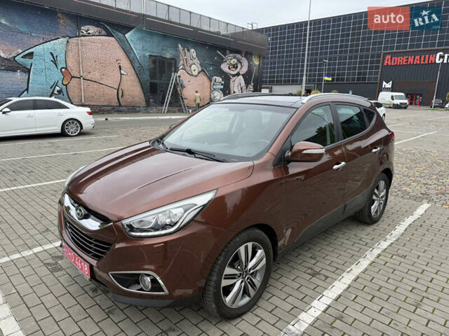 Коричневий Хендай іх35, об'ємом двигуна 2 л та пробігом 211 тис. км за 17400 $, фото 9 на Automoto.ua