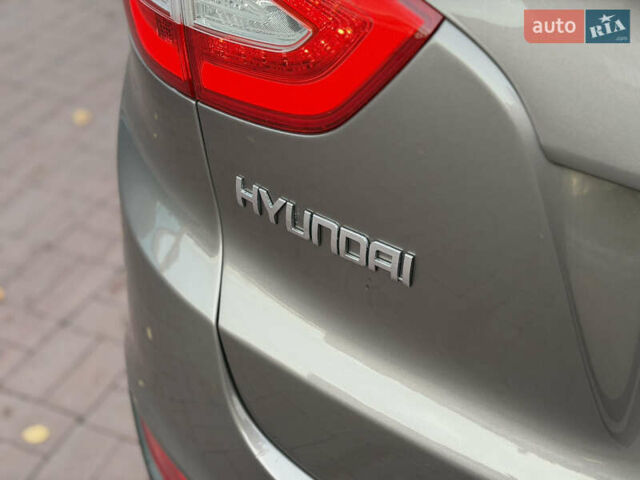 Коричневий Хендай іх35, об'ємом двигуна 2 л та пробігом 230 тис. км за 15300 $, фото 10 на Automoto.ua