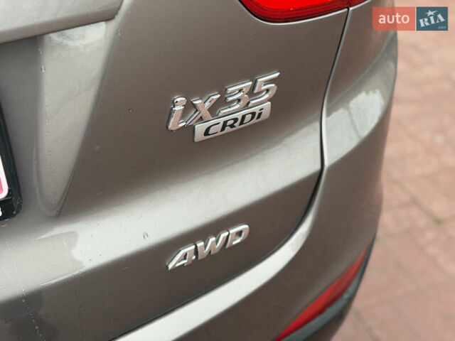 Коричневий Хендай іх35, об'ємом двигуна 2 л та пробігом 230 тис. км за 14300 $, фото 11 на Automoto.ua
