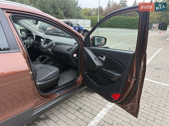 Коричневий Хендай іх35, об'ємом двигуна 2 л та пробігом 211 тис. км за 17400 $, фото 61 на Automoto.ua