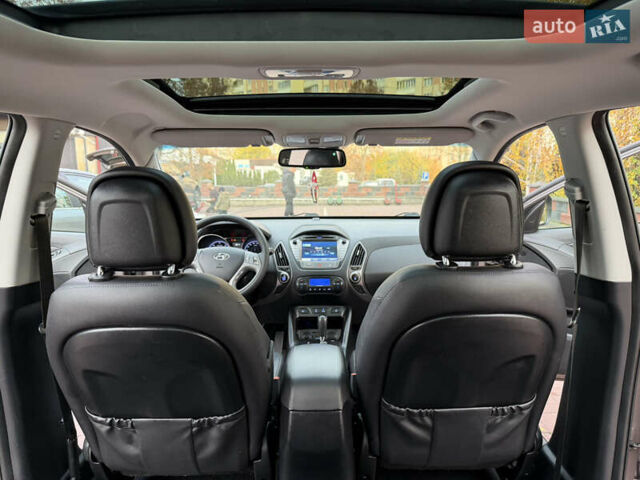 Коричневий Хендай іх35, об'ємом двигуна 2 л та пробігом 230 тис. км за 15300 $, фото 37 на Automoto.ua