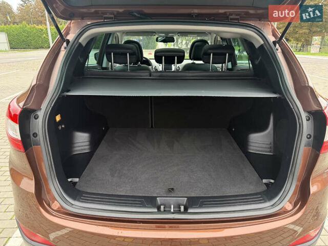 Коричневий Хендай іх35, об'ємом двигуна 2 л та пробігом 211 тис. км за 17400 $, фото 48 на Automoto.ua