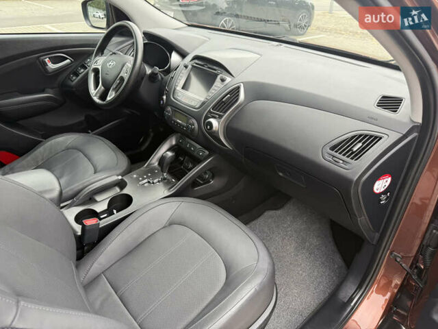 Коричневий Хендай іх35, об'ємом двигуна 2 л та пробігом 211 тис. км за 17400 $, фото 70 на Automoto.ua