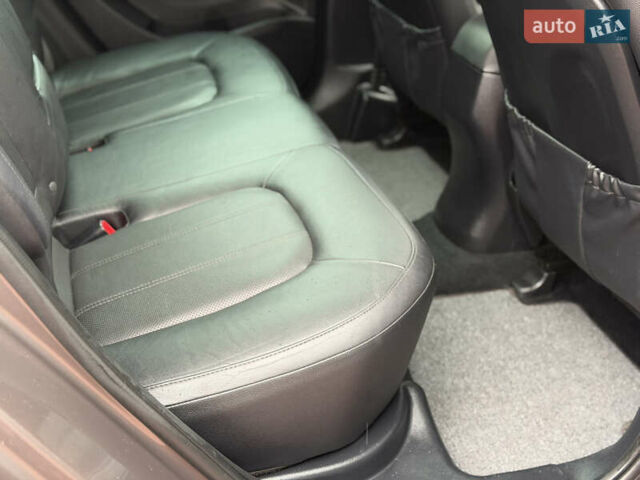 Коричневий Хендай іх35, об'ємом двигуна 2 л та пробігом 230 тис. км за 14300 $, фото 29 на Automoto.ua