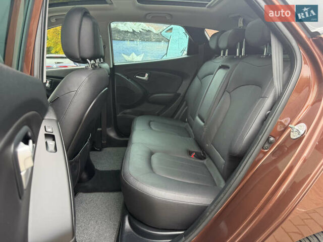 Коричневий Хендай іх35, об'ємом двигуна 2 л та пробігом 211 тис. км за 17400 $, фото 87 на Automoto.ua