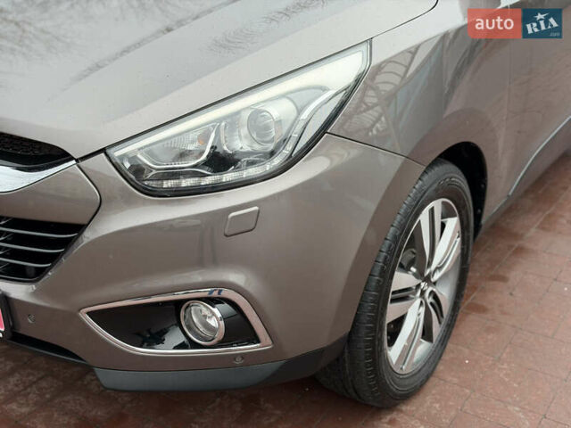 Коричневий Хендай іх35, об'ємом двигуна 2 л та пробігом 230 тис. км за 14300 $, фото 15 на Automoto.ua