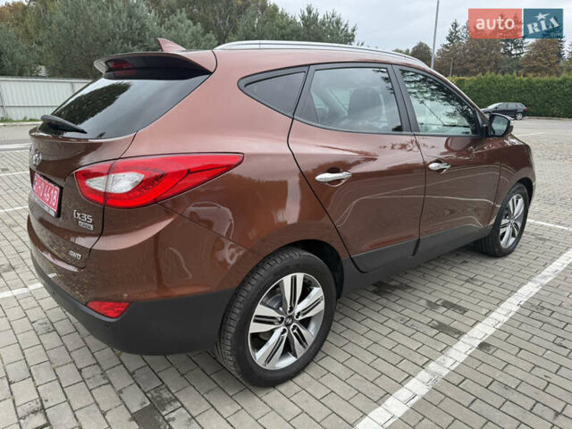 Коричневий Хендай іх35, об'ємом двигуна 2 л та пробігом 211 тис. км за 17400 $, фото 18 на Automoto.ua