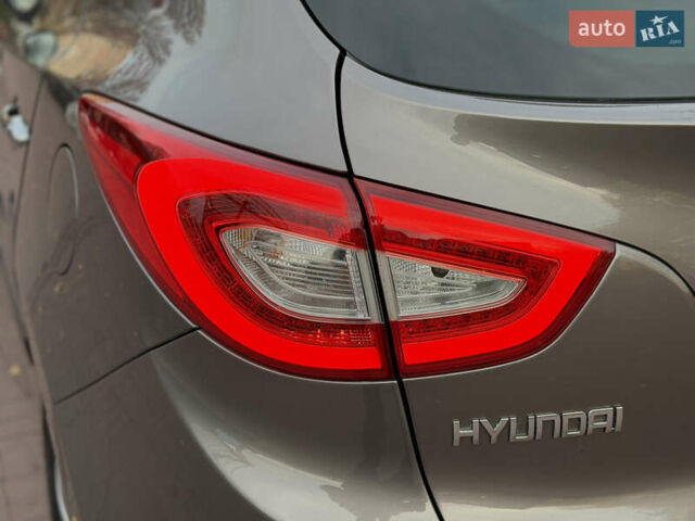 Коричневий Хендай іх35, об'ємом двигуна 2 л та пробігом 230 тис. км за 15300 $, фото 62 на Automoto.ua