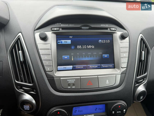 Коричневий Хендай іх35, об'ємом двигуна 2 л та пробігом 211 тис. км за 17400 $, фото 26 на Automoto.ua