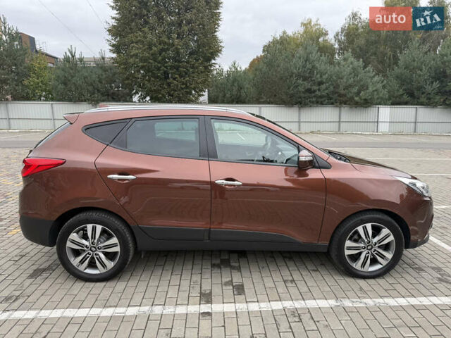 Коричневий Хендай іх35, об'ємом двигуна 2 л та пробігом 211 тис. км за 17400 $, фото 17 на Automoto.ua