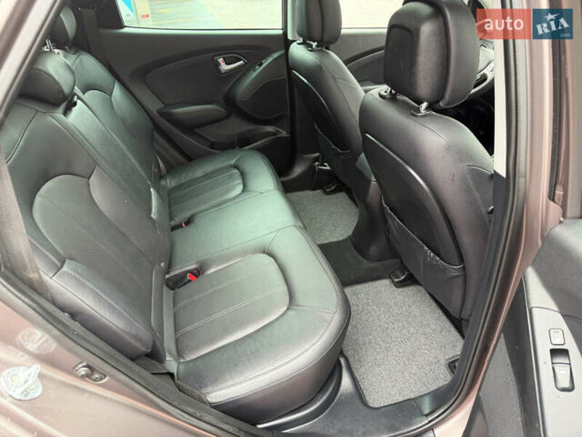 Коричневий Хендай іх35, об'ємом двигуна 2 л та пробігом 230 тис. км за 14300 $, фото 58 на Automoto.ua