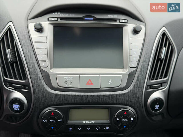 Коричневий Хендай іх35, об'ємом двигуна 2 л та пробігом 230 тис. км за 14300 $, фото 40 на Automoto.ua