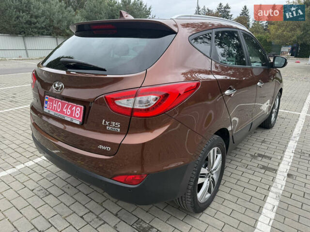 Коричневий Хендай іх35, об'ємом двигуна 2 л та пробігом 211 тис. км за 17400 $, фото 19 на Automoto.ua