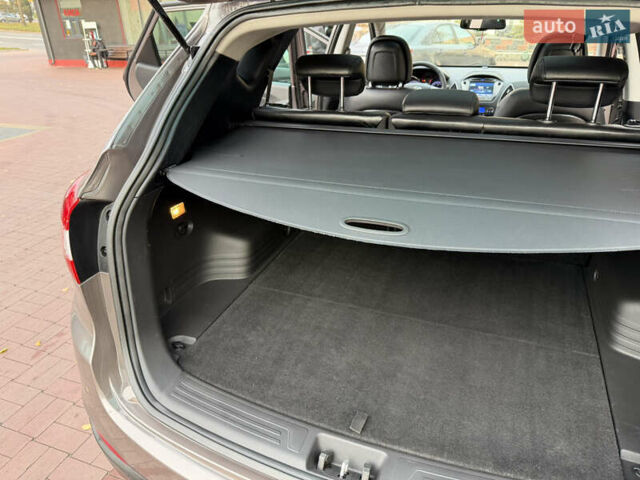 Коричневий Хендай іх35, об'ємом двигуна 2 л та пробігом 230 тис. км за 15300 $, фото 34 на Automoto.ua