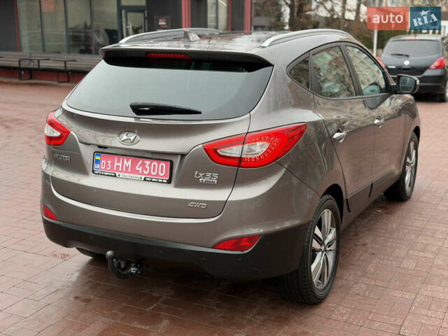 Коричневий Хендай іх35, об'ємом двигуна 2 л та пробігом 230 тис. км за 14300 $, фото 9 на Automoto.ua