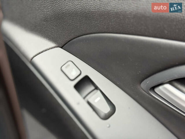 Коричневий Хендай іх35, об'ємом двигуна 2 л та пробігом 230 тис. км за 14300 $, фото 31 на Automoto.ua