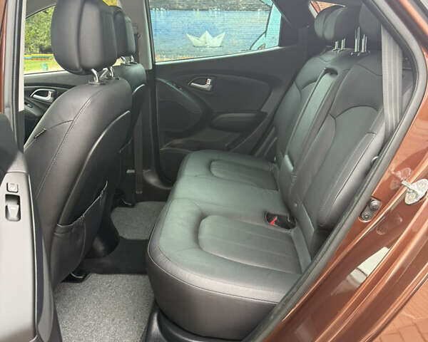 Коричневий Хендай іх35, об'ємом двигуна 2 л та пробігом 211 тис. км за 17400 $, фото 86 на Automoto.ua