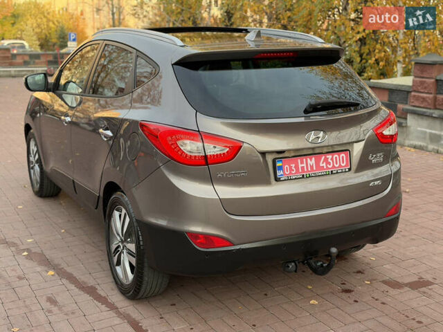 Коричневий Хендай іх35, об'ємом двигуна 2 л та пробігом 230 тис. км за 15300 $, фото 8 на Automoto.ua