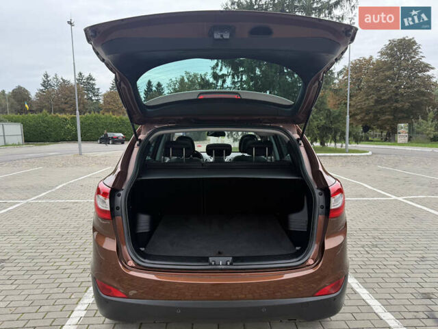 Коричневий Хендай іх35, об'ємом двигуна 2 л та пробігом 211 тис. км за 17400 $, фото 47 на Automoto.ua