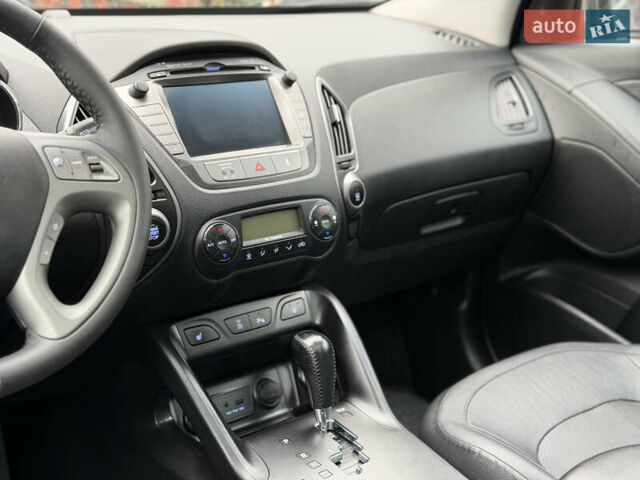 Коричневий Хендай іх35, об'ємом двигуна 2 л та пробігом 230 тис. км за 14300 $, фото 36 на Automoto.ua