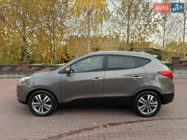 Коричневий Хендай іх35, об'ємом двигуна 2 л та пробігом 230 тис. км за 15300 $, фото 13 на Automoto.ua