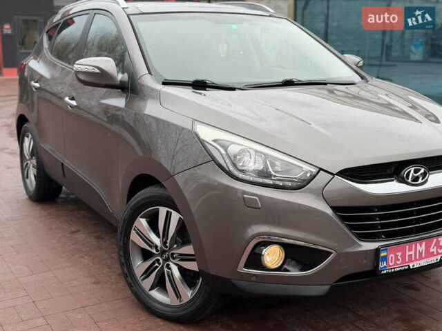Коричневий Хендай іх35, об'ємом двигуна 2 л та пробігом 230 тис. км за 14300 $, фото 51 на Automoto.ua
