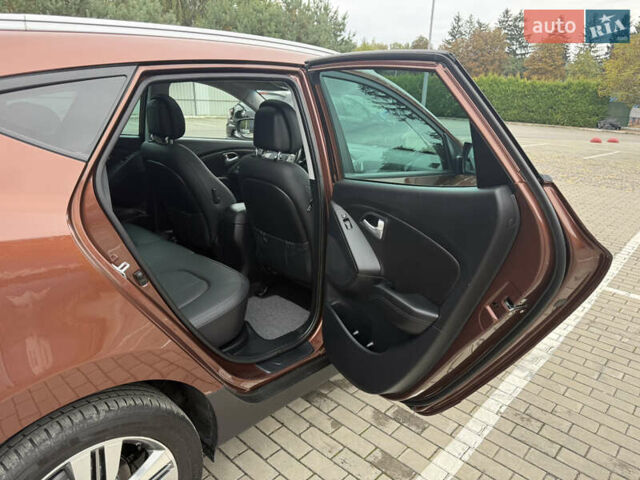 Коричневий Хендай іх35, об'ємом двигуна 2 л та пробігом 211 тис. км за 17400 $, фото 71 на Automoto.ua