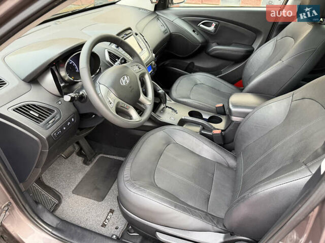 Коричневий Хендай іх35, об'ємом двигуна 2 л та пробігом 230 тис. км за 15300 $, фото 63 на Automoto.ua