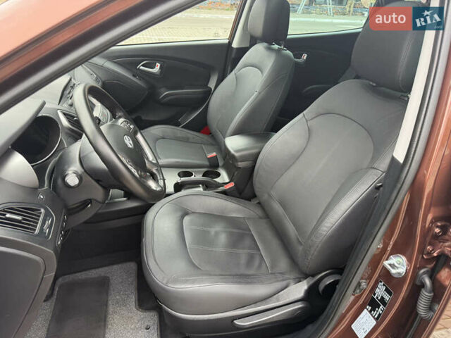 Коричневий Хендай іх35, об'ємом двигуна 2 л та пробігом 211 тис. км за 17400 $, фото 99 на Automoto.ua