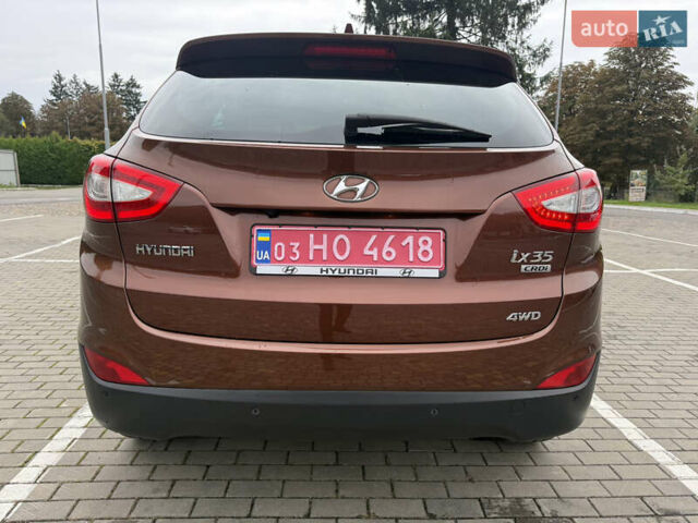 Коричневий Хендай іх35, об'ємом двигуна 2 л та пробігом 211 тис. км за 17400 $, фото 20 на Automoto.ua