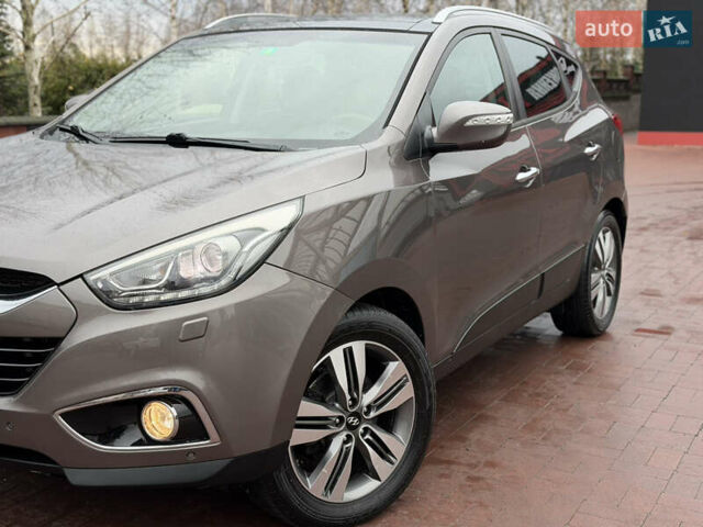 Коричневий Хендай іх35, об'ємом двигуна 2 л та пробігом 230 тис. км за 14300 $, фото 50 на Automoto.ua