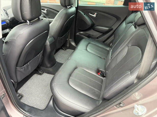 Коричневий Хендай іх35, об'ємом двигуна 2 л та пробігом 230 тис. км за 14300 $, фото 59 на Automoto.ua