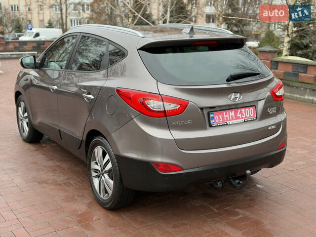 Коричневий Хендай іх35, об'ємом двигуна 2 л та пробігом 230 тис. км за 14300 $, фото 8 на Automoto.ua