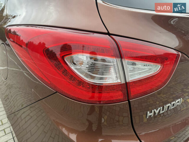 Коричневий Хендай іх35, об'ємом двигуна 2 л та пробігом 211 тис. км за 17400 $, фото 40 на Automoto.ua