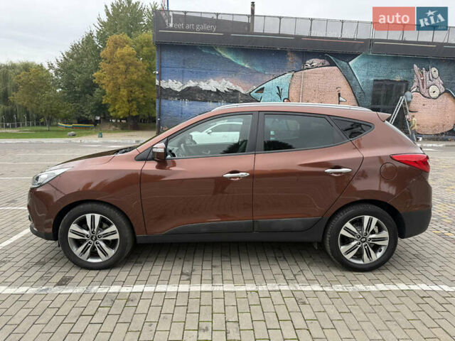 Коричневий Хендай іх35, об'ємом двигуна 2 л та пробігом 211 тис. км за 17400 $, фото 12 на Automoto.ua