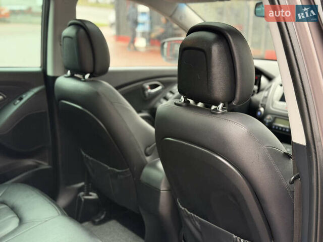 Коричневий Хендай іх35, об'ємом двигуна 2 л та пробігом 230 тис. км за 14300 $, фото 27 на Automoto.ua